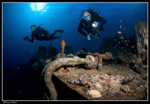 divers on the Thistlegorm by Dray Van Beeck 